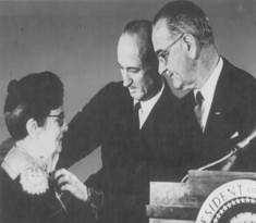 Genevieve Caulfield receiving U.S Medal in 1963